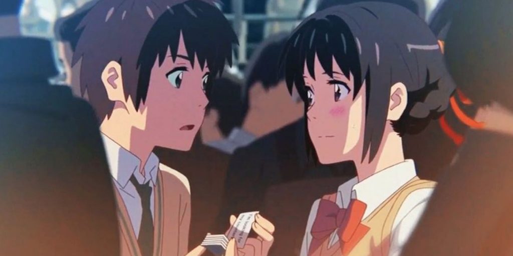 Taki et Mitsuha dans le métro à Tokyo.
